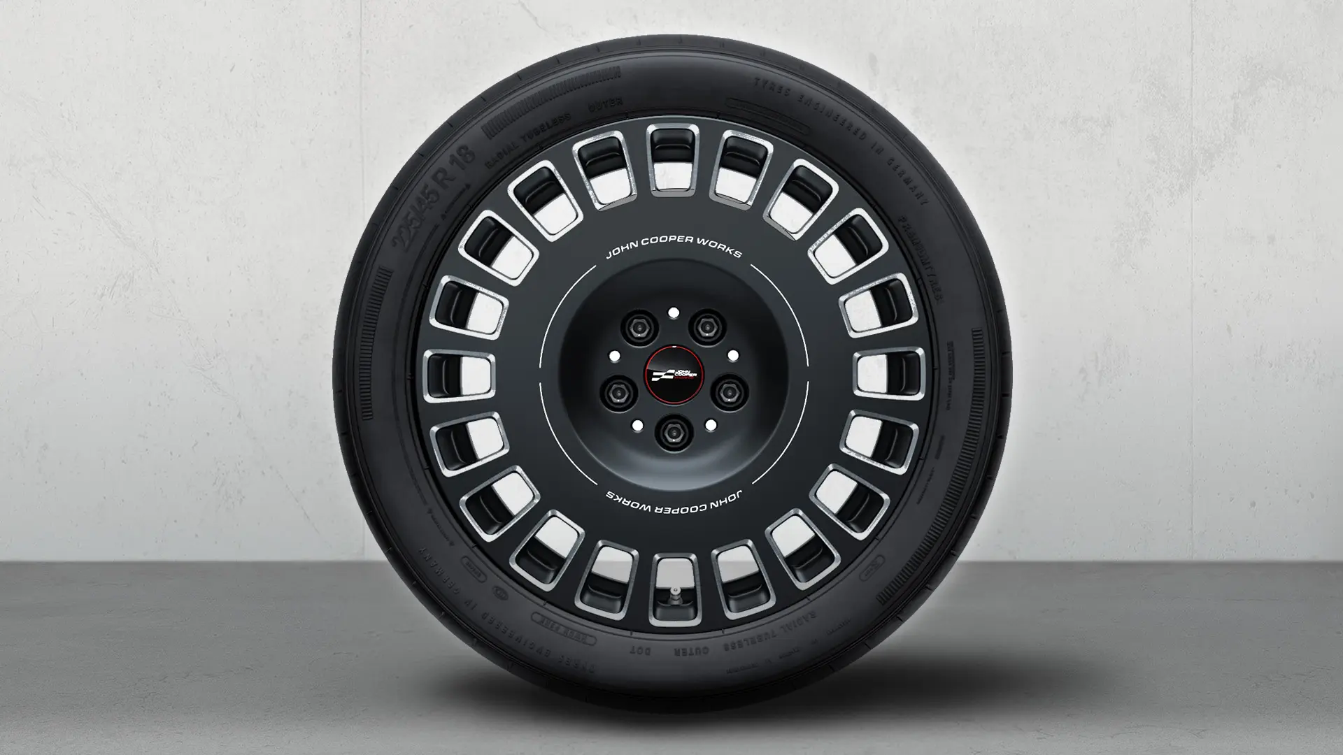 Cerchi in lega JCW da 18" Rallye Spoke 992 Bicolor (Frozen Midnight Grey, lucido), set completo di ruote estive.