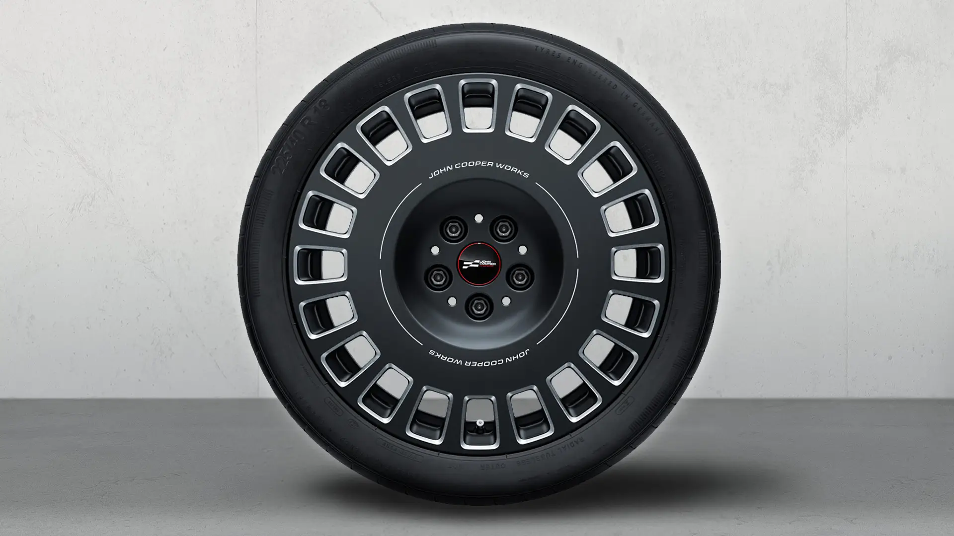 Cerchi in lega JCW da 18" Rallye Spoke 992 Bicolor (Frozen Midnight Grey, lucido), set completo di ruote estive.